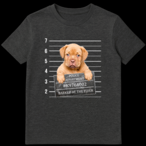 Graphic t-shirt design showing a guilty cat next to a shredded piece of paper with the text He swears it was self-defense on Dark Heather t-shirt