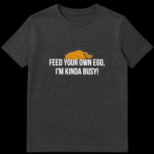 Cartoon orange cat sleeping flat on its stomach with white text saying Feed Your Own Ego I'm Kinda Busy on a dark background on Dark Heather t-shirt