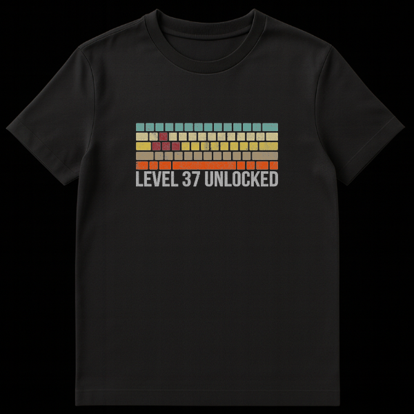 Retro video game style graphic with colored bricks and text reading Level 37 Unlocked in a distressed font on Black t-shirt