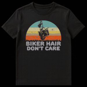 Vintage style t-shirt design featuring a silhouette of a woman on a motorcycle against a retro sunset with the text Biker Hair Don't Care on Black t-shirt