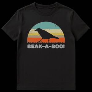 Retro style illustration of a black crow looking around a corner with text reading Beak-a-boo on a t-shirt on Black t-shirt