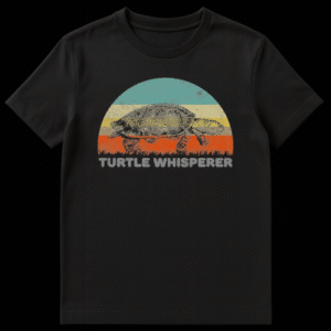Vintage style t-shirt design featuring a woodcut turtle illustration walking in front of a retro teal and orange striped sunset with Turtle Whisperer text on Black t-shirt