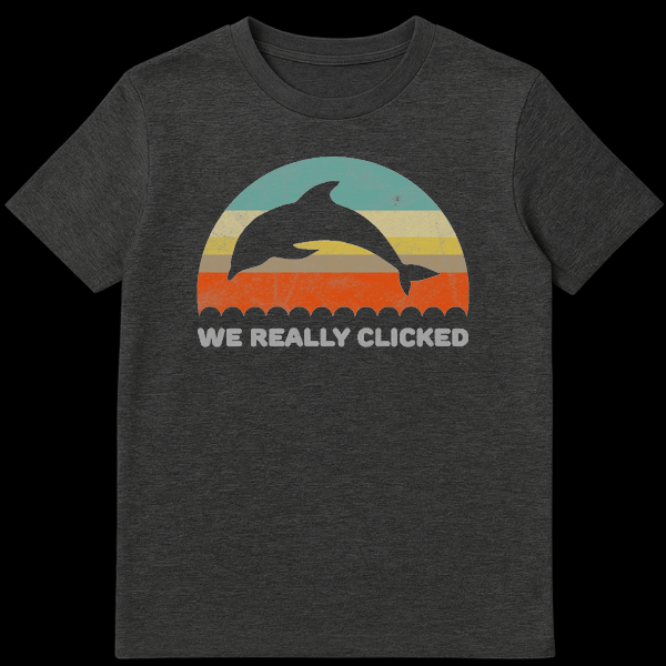 Distressed retro sunset t-shirt design featuring two jumping dolphins and the pun text 'We Really Clicked' on Dark Heather t-shirt