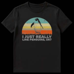 Vintage style t-shirt design with a sketch of a penguin in front of a retro striped sunset with text I Just Really Like Penguins Ok on Black t-shirt