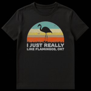 Black silhouette of a flamingo standing on one leg in front of a retro striped sunset with the text I Just Really Like Flamingos OK on Black t-shirt