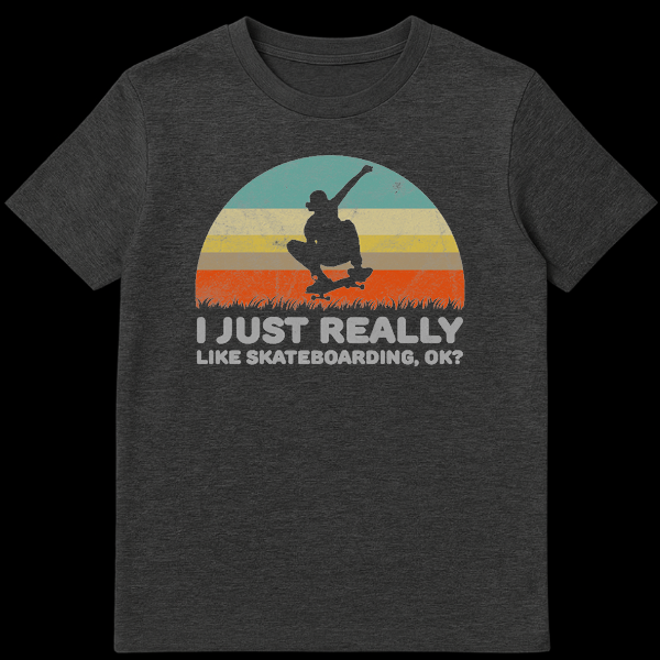 Silhouette of a skateboarder doing a trick in front of a retro striped sunset with the text I Just Really Like Skateboarding Ok on Dark Heather t-shirt