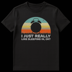 Black silhouette of an alarm clock against a retro striped sunset with text I Just Really Like Sleeping In OK on Black t-shirt