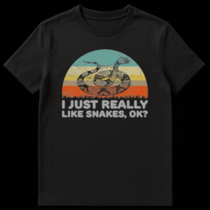 Retro vintage sunset t-shirt design with a coiled snake illustration and text reading I Just Really Like Snakes Ok on Black t-shirt