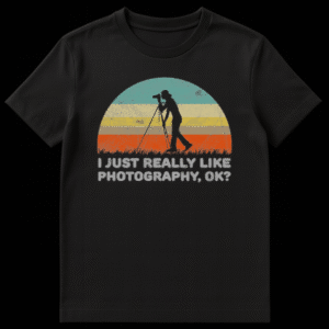 Retro sunset graphic t-shirt with black silhouette of photographer on tripod and funny text I Just Really Like Photography Ok on Black t-shirt