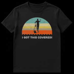 Black t-shirt design with a semi-circle of distressed teal, yellow, brown, and orange stripes. A black silhouette of a person on a ladder holding a paint roller and a paint can is centered on top. Below, the text 'I GOT THIS COVERED!' is in distressed light gray capital letters. on Black t-shirt