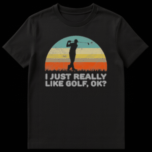 Black t-shirt with a retro sunset design featuring distressed stripes in blue, yellow, brown, and orange-red. A black silhouette of a golfer mid-swing is superimposed. Below, the text 'I JUST REALLY LIKE GOLF, OK?' is displayed in distressed grey letters. on Black t-shirt
