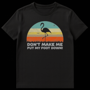 Humorous flamingo t-shirt with 'Don't Make Me Put My Foot Down!' slogan, black flamingo silhouette on retro striped background on Black t-shirt