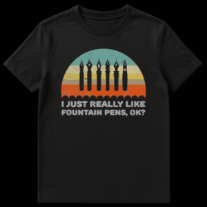 Retro distressed black t-shirt with fountain pen nib silhouettes and text 'I JUST REALLY LIKE FOUNTAIN PENS, OK?' on a striped background. on Black t-shirt