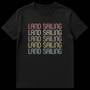 Vintage retro-style t-shirt with repeated "LAND SAILING" text in distressed, multi-colored fonts on a black background, featuring a striped letter effect. on Black t-shirt