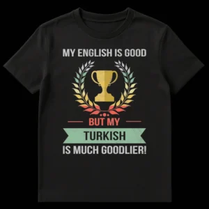 Humorous Turkish language t-shirt with 'My English is Good but My Turkish is Much Goodlier!' text, trophy, and laurel wreath. on Black t-shirt