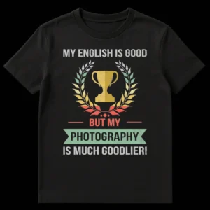 Distressed vintage black t-shirt with 'My English is Good But My Photography Is Much Goodlier!' text, laurel wreath, and trophy graphic. on Black t-shirt