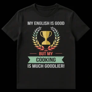 Distressed t-shirt with text 'MY ENGLISH IS GOOD BUT MY COOKING IS MUCH GOODLIER!' and a golden trophy with a multi-colored laurel wreath. on Black t-shirt