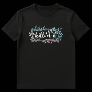T-shirt with 'killin' it' text, gold rectangle frame, and watercolor botanical leaves and flowers on a black background on Black t-shirt