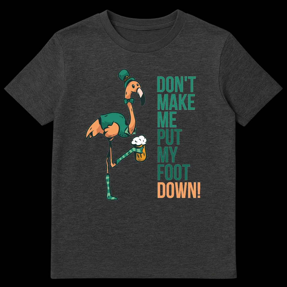 Humorous St. Patrick's Day t-shirt featuring a cartoon flamingo in green attire holding a beer mug with its foot, with the text 'DON'T MAKE ME PUT MY FOOT DOWN!' on Dark Heather t-shirt