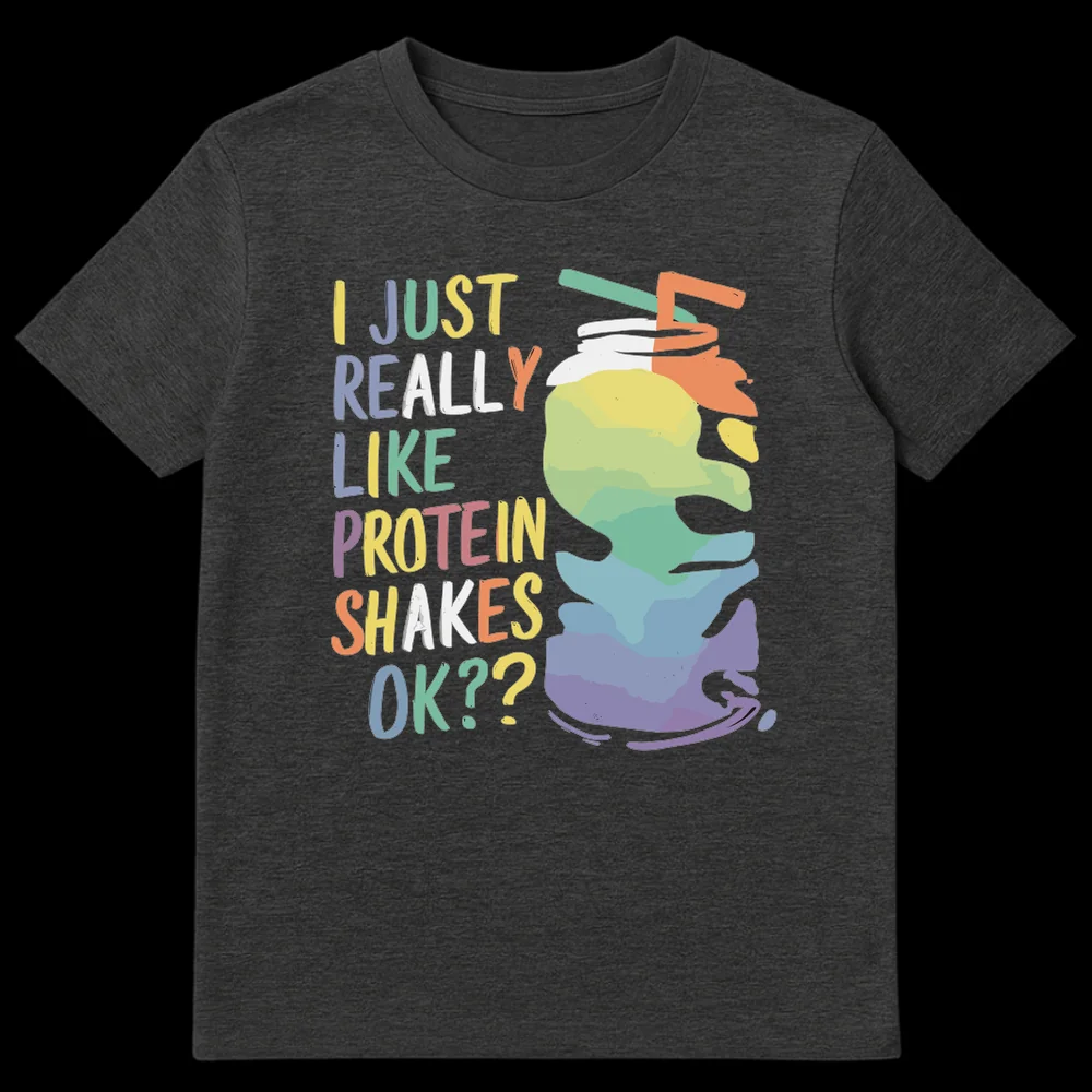 Humorous 'I JUST REALLY LIKE PROTEIN SHAKES OK??' t-shirt with a colorful, whimsical protein shake illustration and pastel typography on a black background, perfect for fitness enthusiasts. on Dark Heather t-shirt