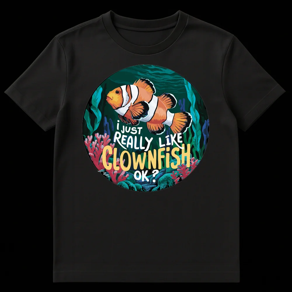 Vibrant clownfish t-shirt with text 'I JUST REALLY LIKE CLOWNFISH OK ?' amidst coral reef art. on Black t-shirt
