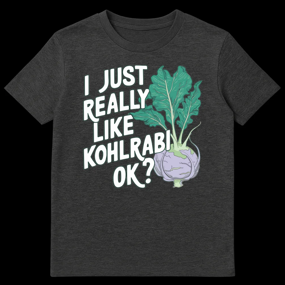 Black t-shirt with a cartoon kohlrabi illustration and white text 'I JUST REALLY LIKE KOHLRABI OK?' outlined in dark teal. on Dark Heather t-shirt