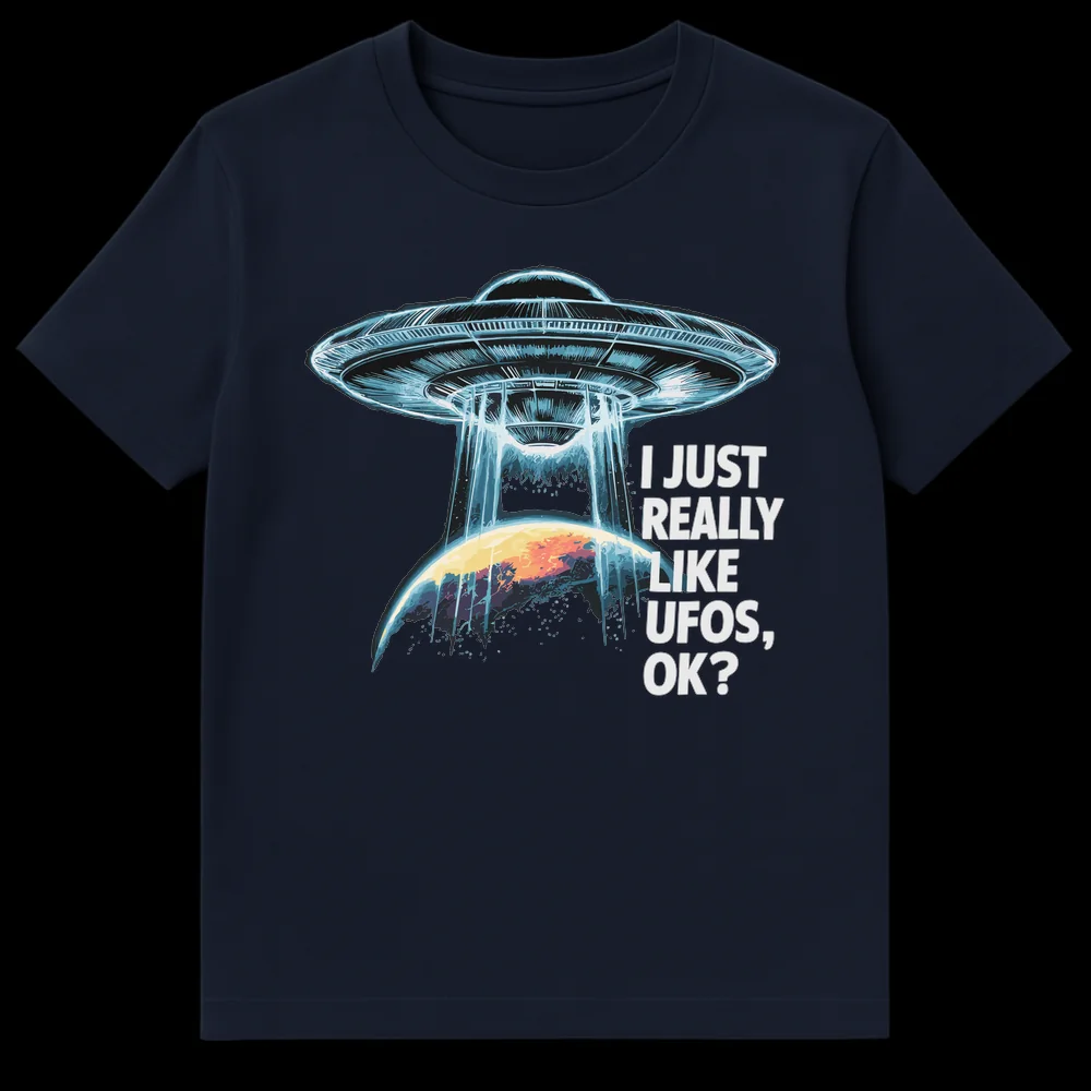 UFO Enthusiast Unisex T-Shirt with 'I JUST REALLY LIKE UFOS, OK?' text, featuring a detailed flying saucer, tractor beam, and planet design on a black background. on Navy Blue t-shirt