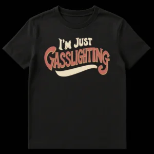 Retro style 'I'M JUST GASSLIGHTING' t-shirt with vintage colors, appealing to fans of internet culture and dark humor on Black t-shirt