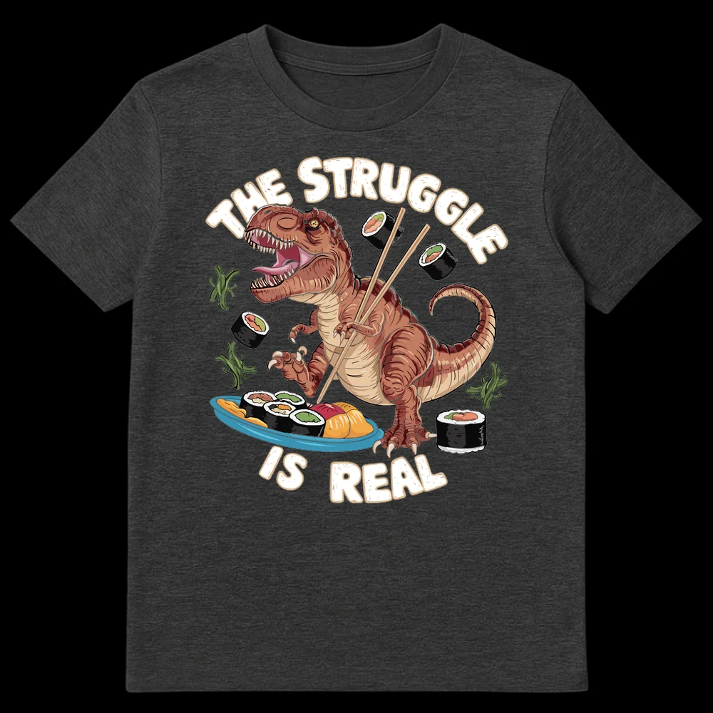 Funny T-Rex dinosaur struggling to eat sushi with chopsticks with the text "THE STRUGGLE IS REAL" on Dark Heather t-shirt