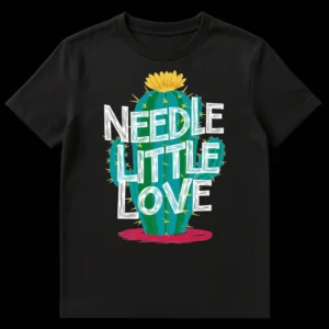 Black t-shirt with a whimsical illustration of a green prickly pear cactus, a yellow flower, and yellow needles. The white text reads 'NEEDLE LITTLE LOVE.' on Black t-shirt
