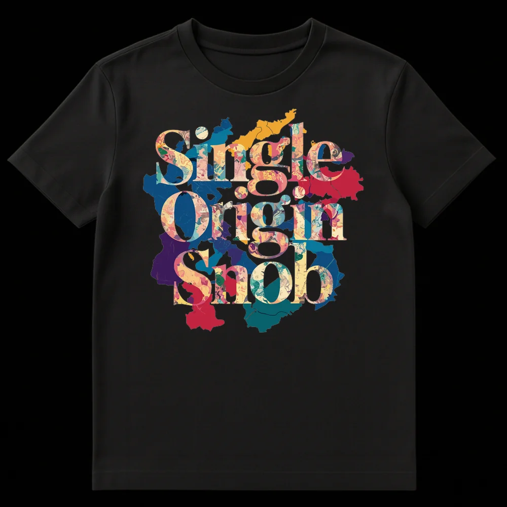 Single Origin Snob t-shirt with abstract liquid-marbled letters in warm tones and map-like background shapes on a black tee on Black t-shirt