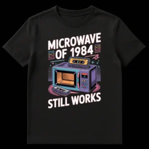 Retro 80s style t-shirt design featuring a vintage 1984 microwave with cassette tapes and the text 'MICROWAVE OF 1984 STILL WORKS' on Black t-shirt