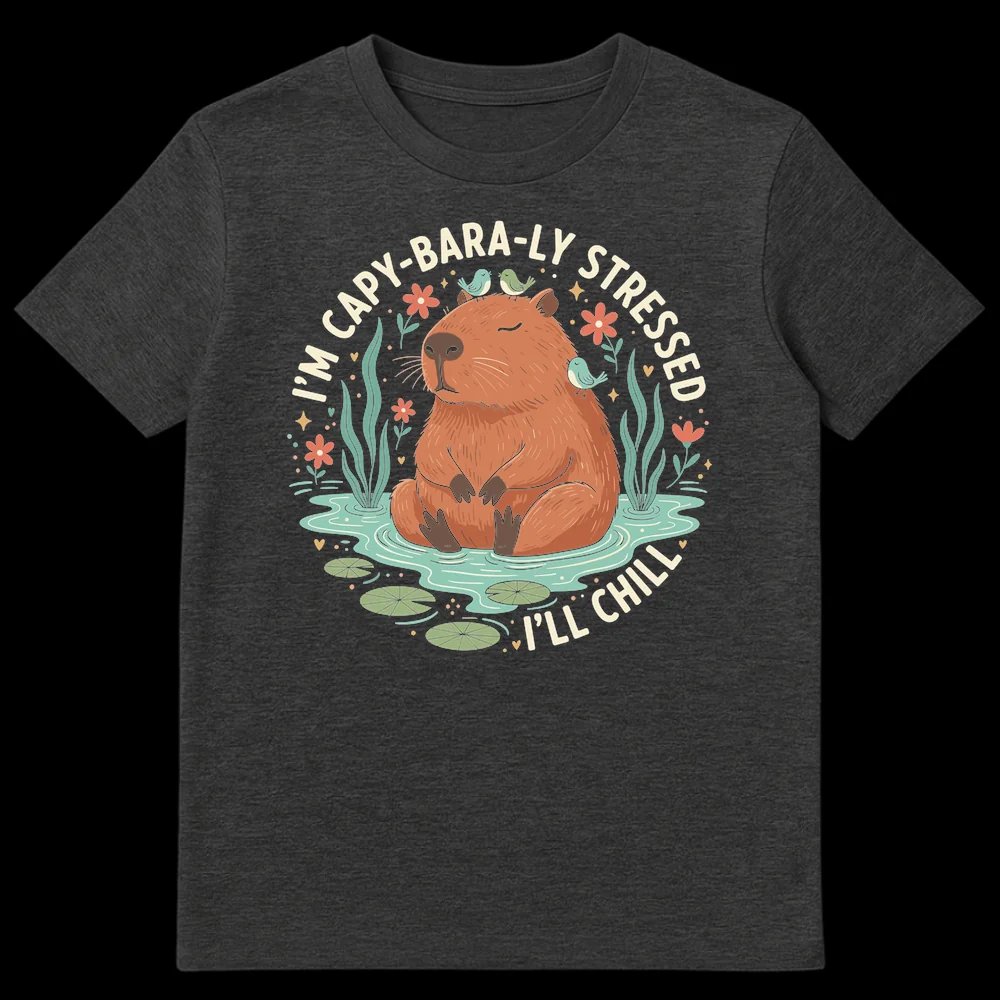 Zen capybara t-shirt design with 'I'M CAPY-BARA-LY STRESSED, I'LL CHILL' text, featuring a capybara in water with birds and plants on Dark Heather t-shirt